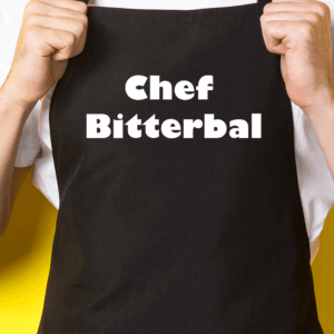 Zwart keukenschort / BBQ-schort met tekst | Chef Bitterbal